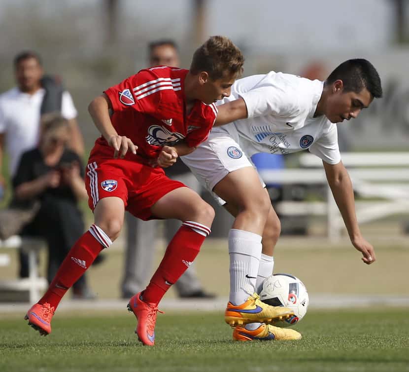 Chicago Magic PSG U14 Pre Academy player Gilberto Gomez (72, right) moves the ball against...