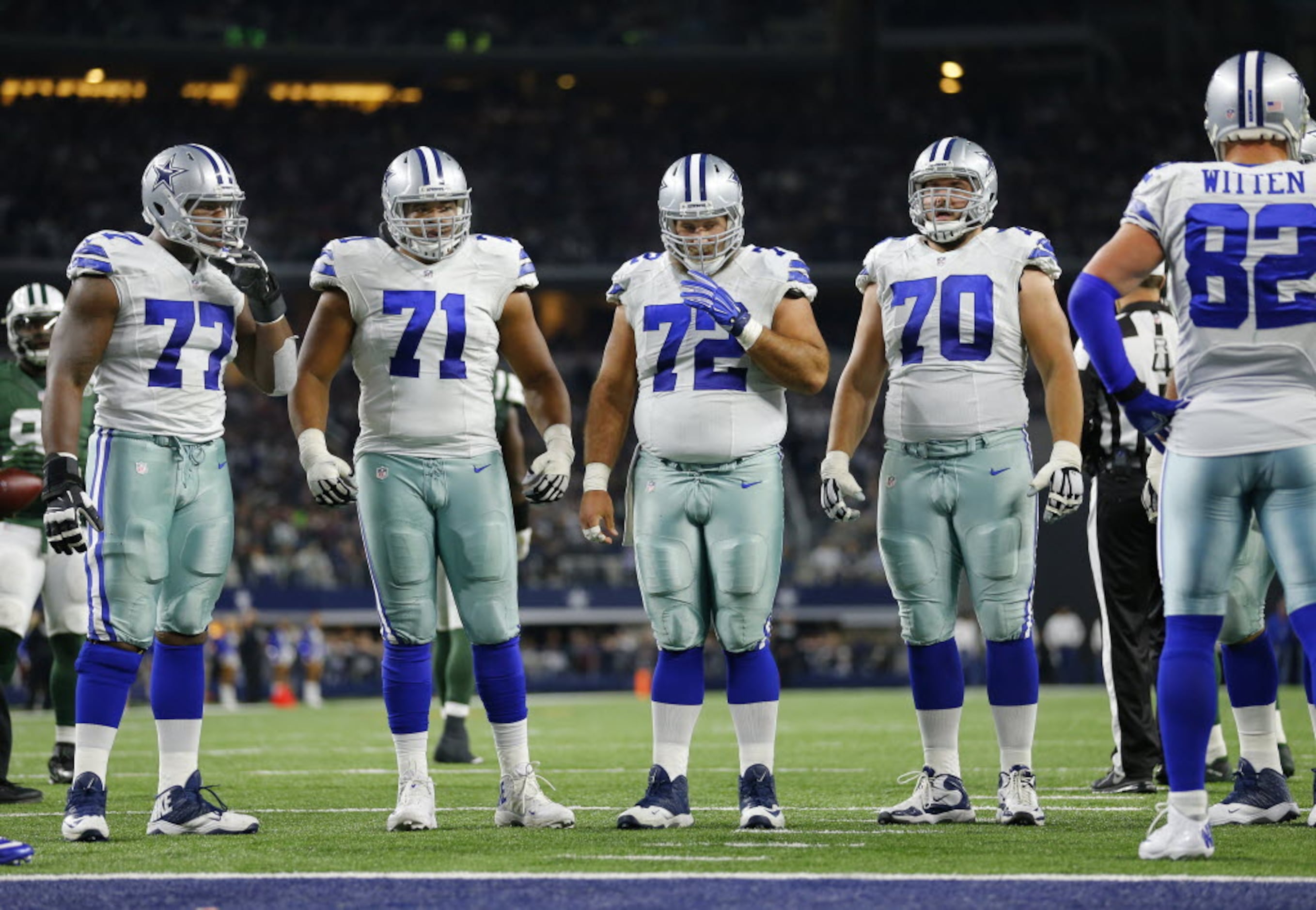 August 26th, 2017:.Dallas Cowboys offensive tackle La'el Collins (71), Dallas  Cowboys guard Zack Martin (70) and Dallas Cowboys center Travis Frederick  (72) during an NFL football game between the Oakland Raiders and