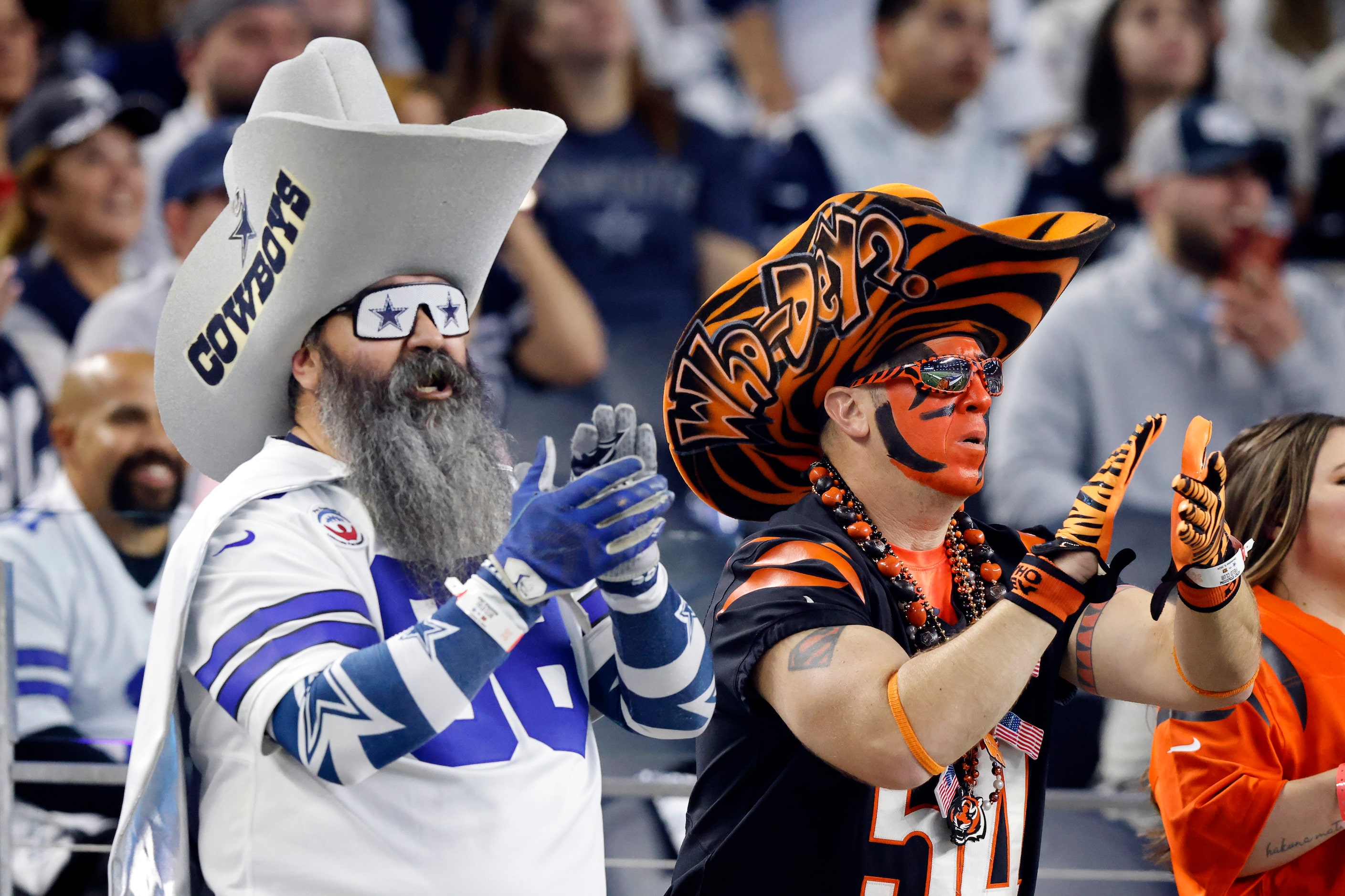 A Dallas Cowboys and Cincinnati Bengals fan dressed the part during the first half of their...