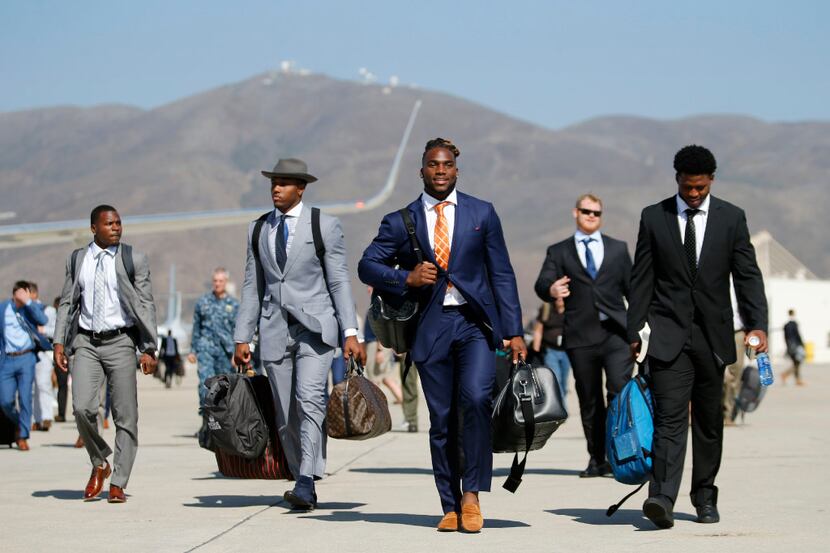 Dallas Cowboys defensive end Taco Charlton (L-R, beginning with 2nd from left), Dallas...