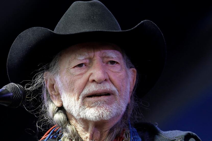 FILE - Willie Nelson performing at the 2013 New Orleans Jazz and Heritage Festival in New...
