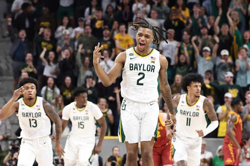 Baylor guard Jayden Nunn reacts after a 3-point basket oagainst Iowa State in the first half...