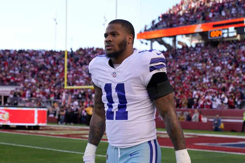 Dallas Cowboys linebacker Micah Parsons (11) before an NFL divisional round playoff football...