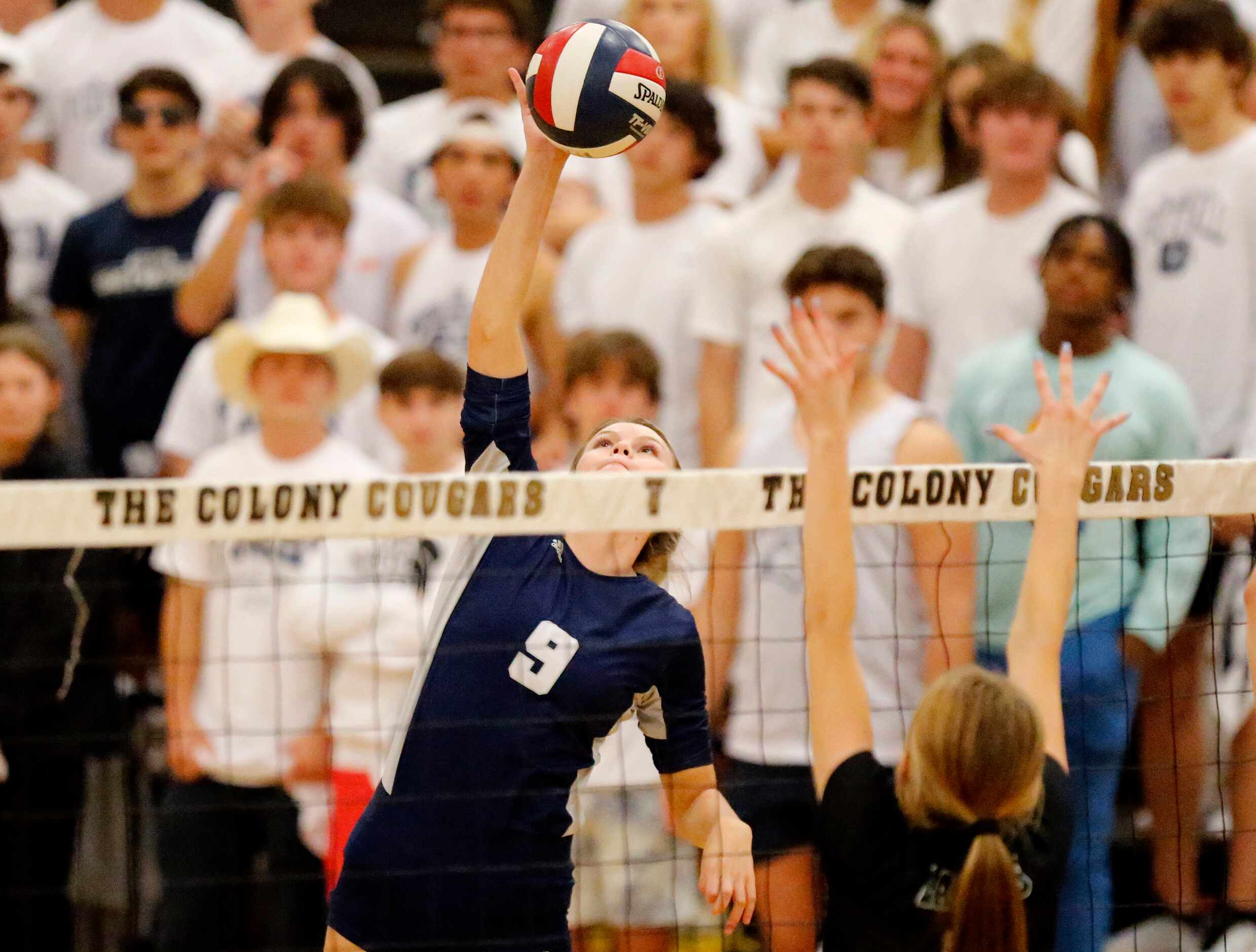 Flower Mound High School outside hitter Gabby Walker (9) gets a hit during game two of the...