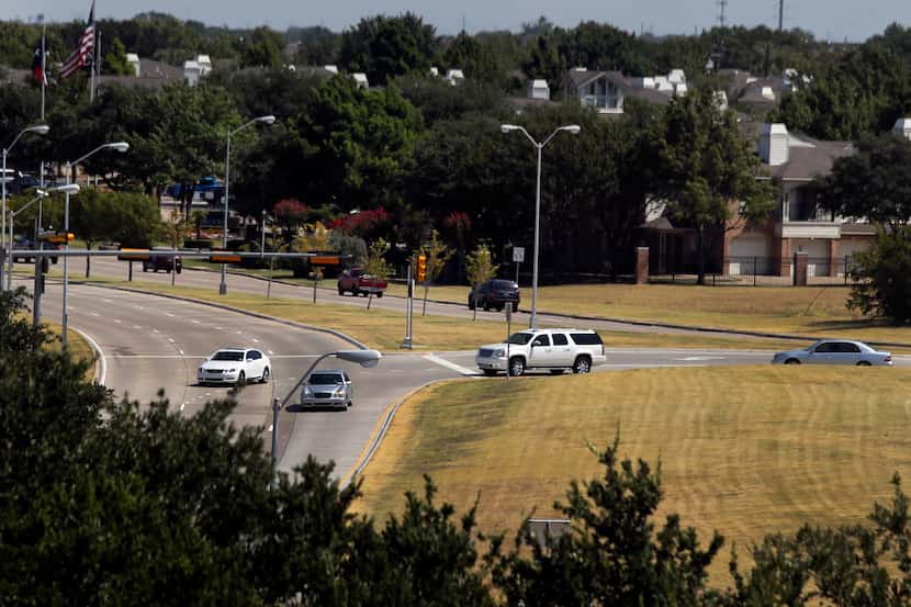 Motorists negotiate a "Michigan Left Turn" from Preston Road onto Legacy in Plano in 2011....