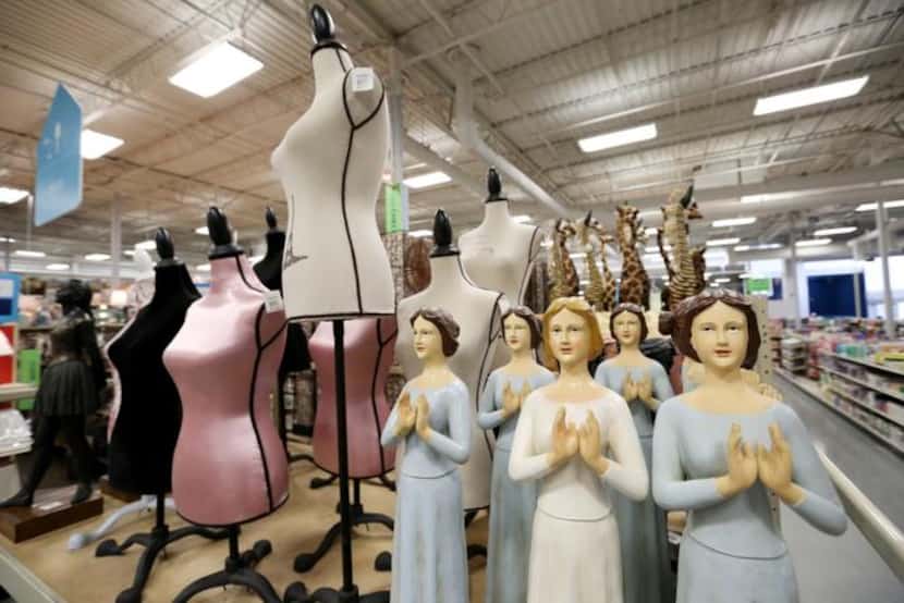 
Household statuettes are shown inside the At Home on Stemmons Freeway in Lewisville. It...