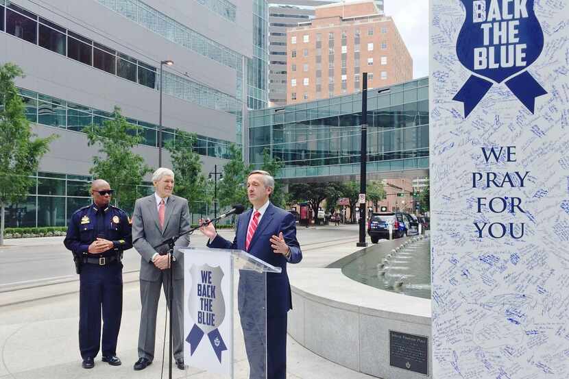 
Dallas police Chief David Brown stands by (at left) as First Baptist Dallas senior pastor...