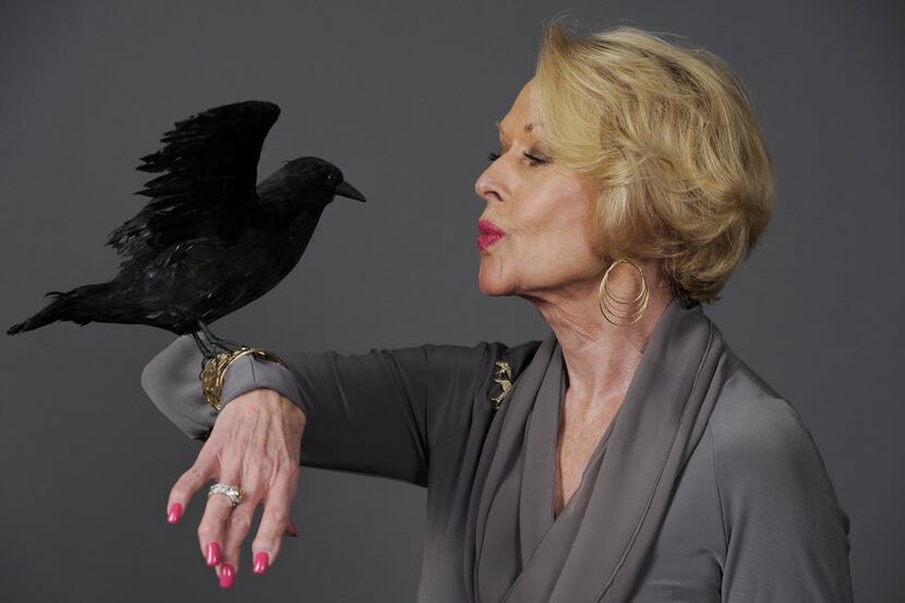 Actress Tippi Hedren, star of the 1963 Alfred Hitchcock film "The Birds," poses with a prop...