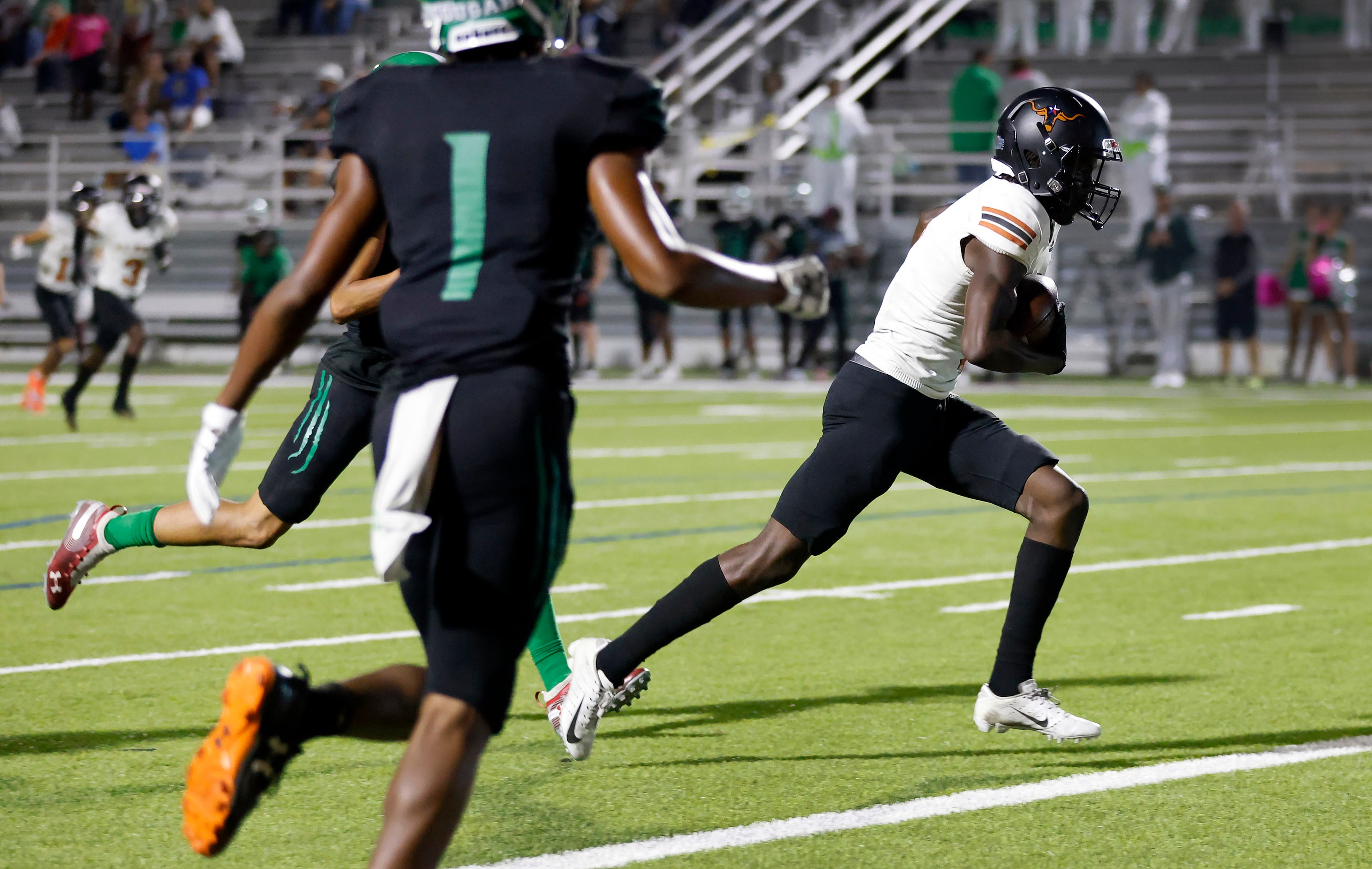 W.T. White wide receiver Demetrious Troupe (8) scores a second quarter touchdown against...