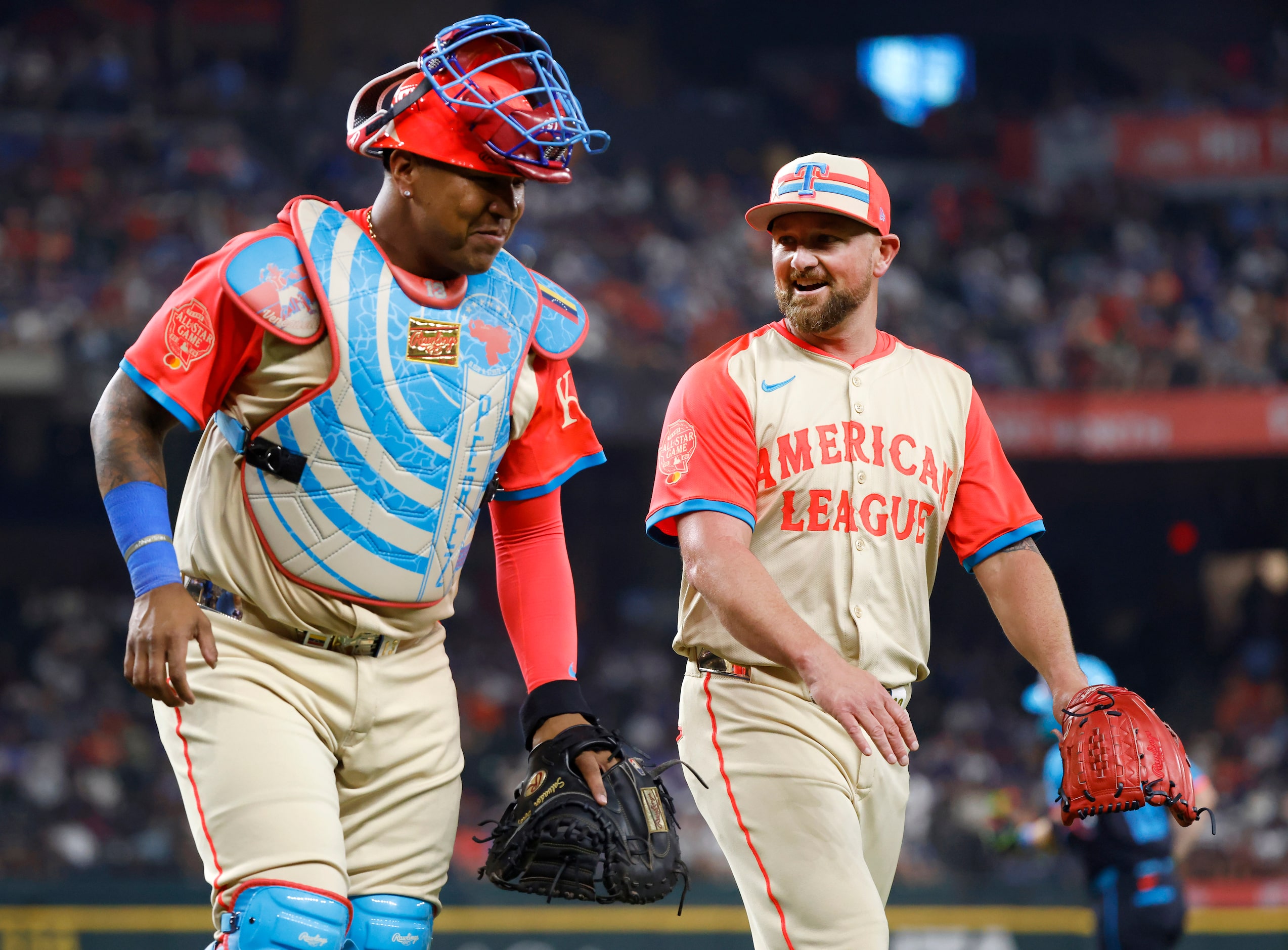 American League pitcher Kirby Yates, of the Texas Rangers, (right) thanks catcher Salvador...