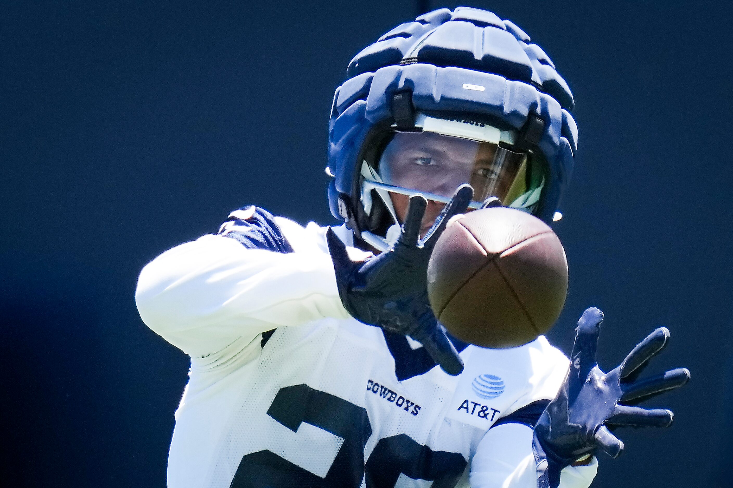 Dallas Cowboys running back Tony Pollard (20) catches a pass during a training camp practice...