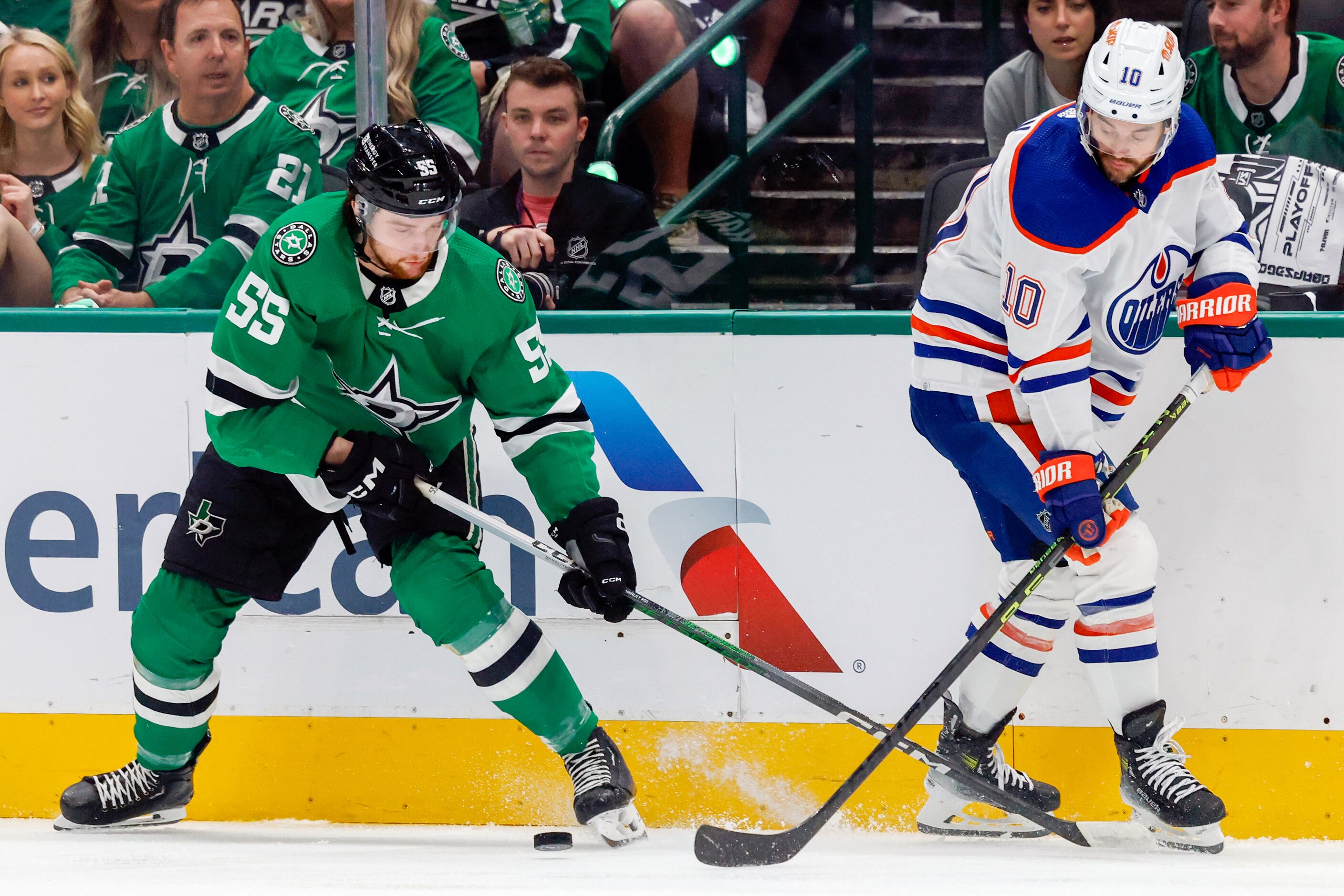 Dallas Stars defenseman Thomas Harley (55) and Edmonton Oilers center Derek Ryan (10) battle...