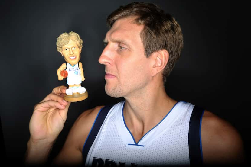 Dallas Mavericks forward Dirk Nowitzki, of Germany, poses for a photo during the NBA...