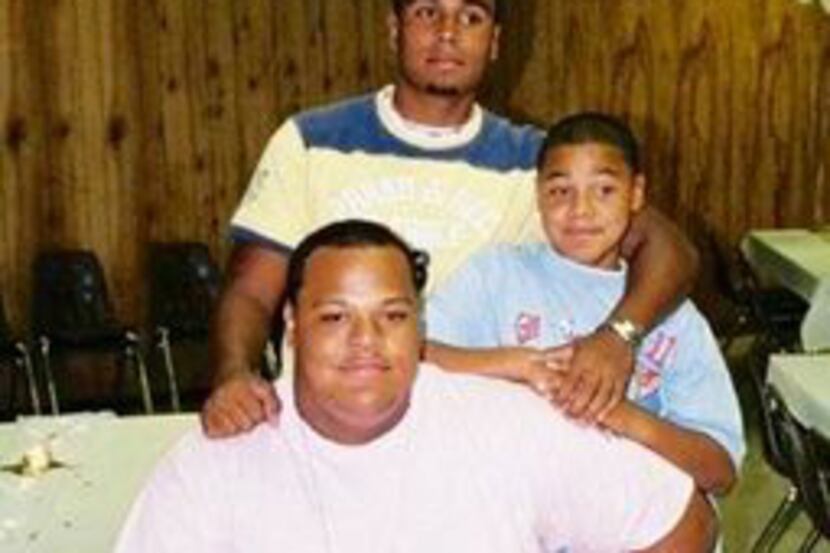 Dak Prescott (middle right) and his brothers Jace (front) and Tad. All three played football...