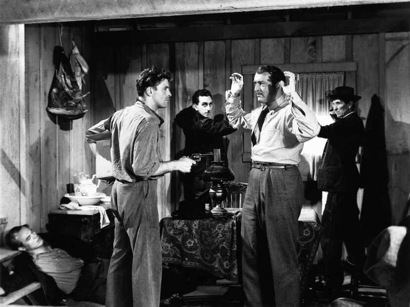 Stick em up: Burt Lancaster made his film debut in the 1946 version of  The Killers....