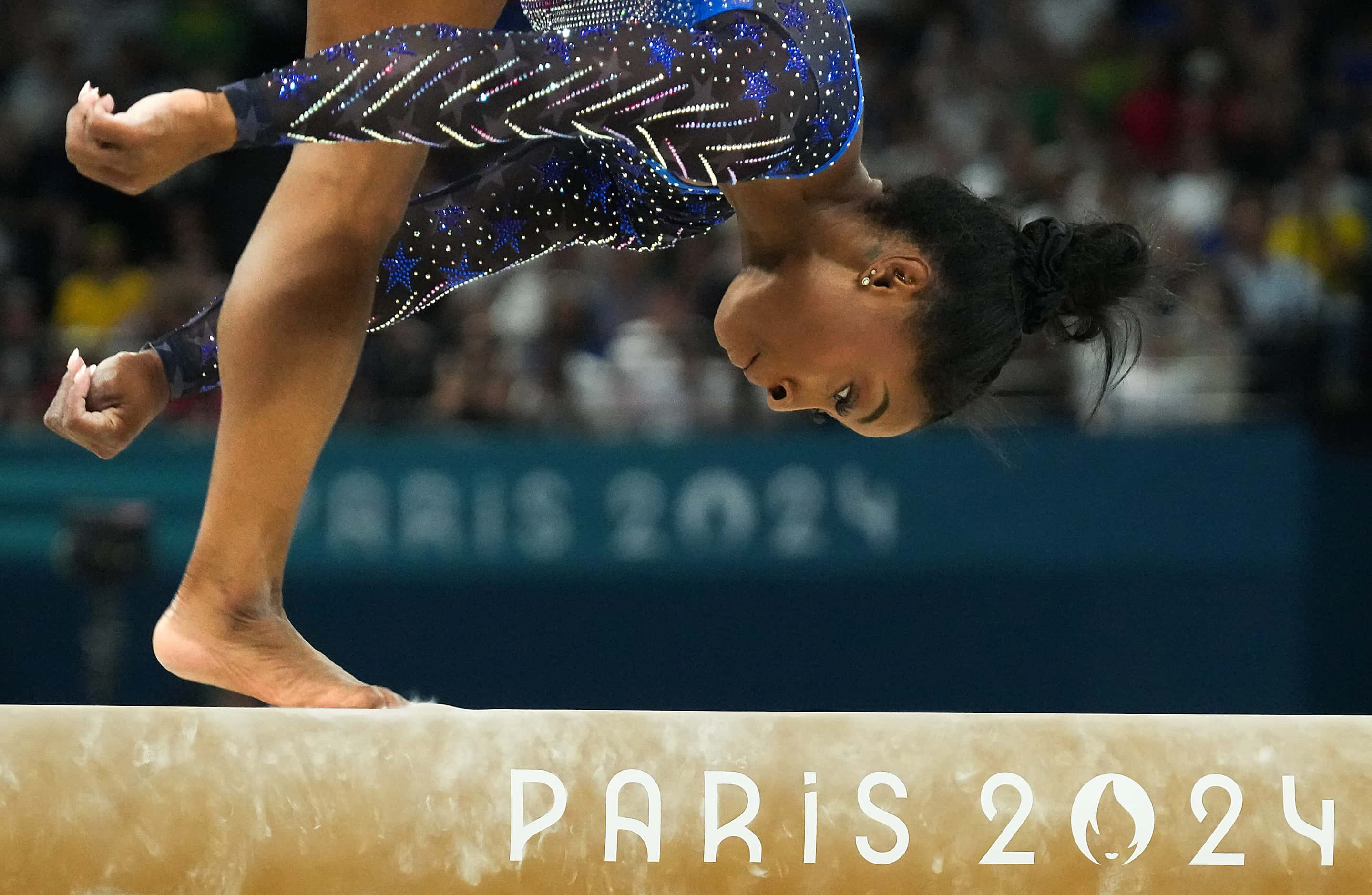 Simone Biles of the United States competes on the balance beam during the women’s gymnastics...