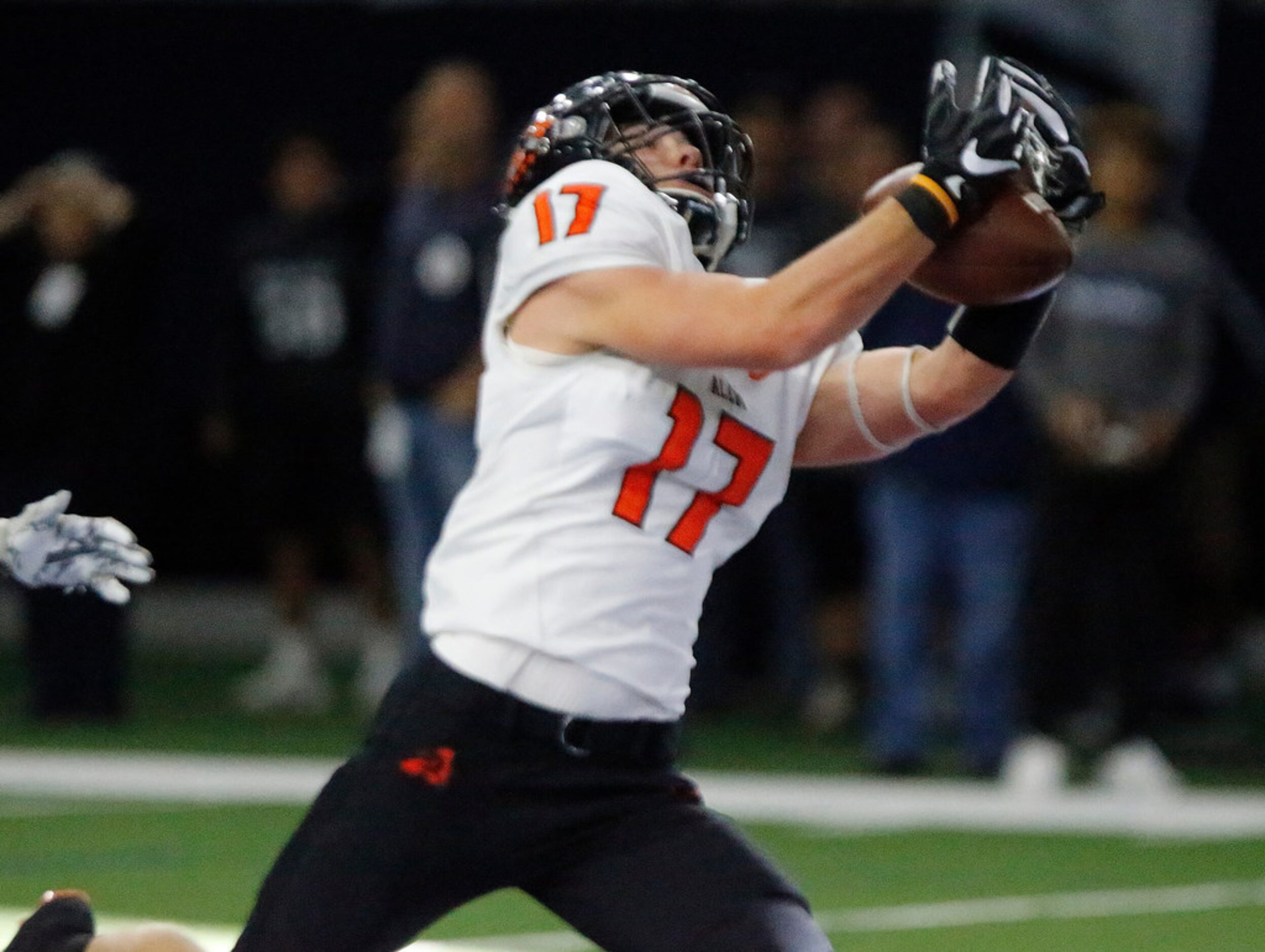 Aledo High School wide receiver Beau Mask (17) catches a touchdown pass during the first...