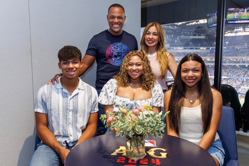 Former Texas Rangers third baseman Adrián Beltré pictured with his wife Sandra, children...