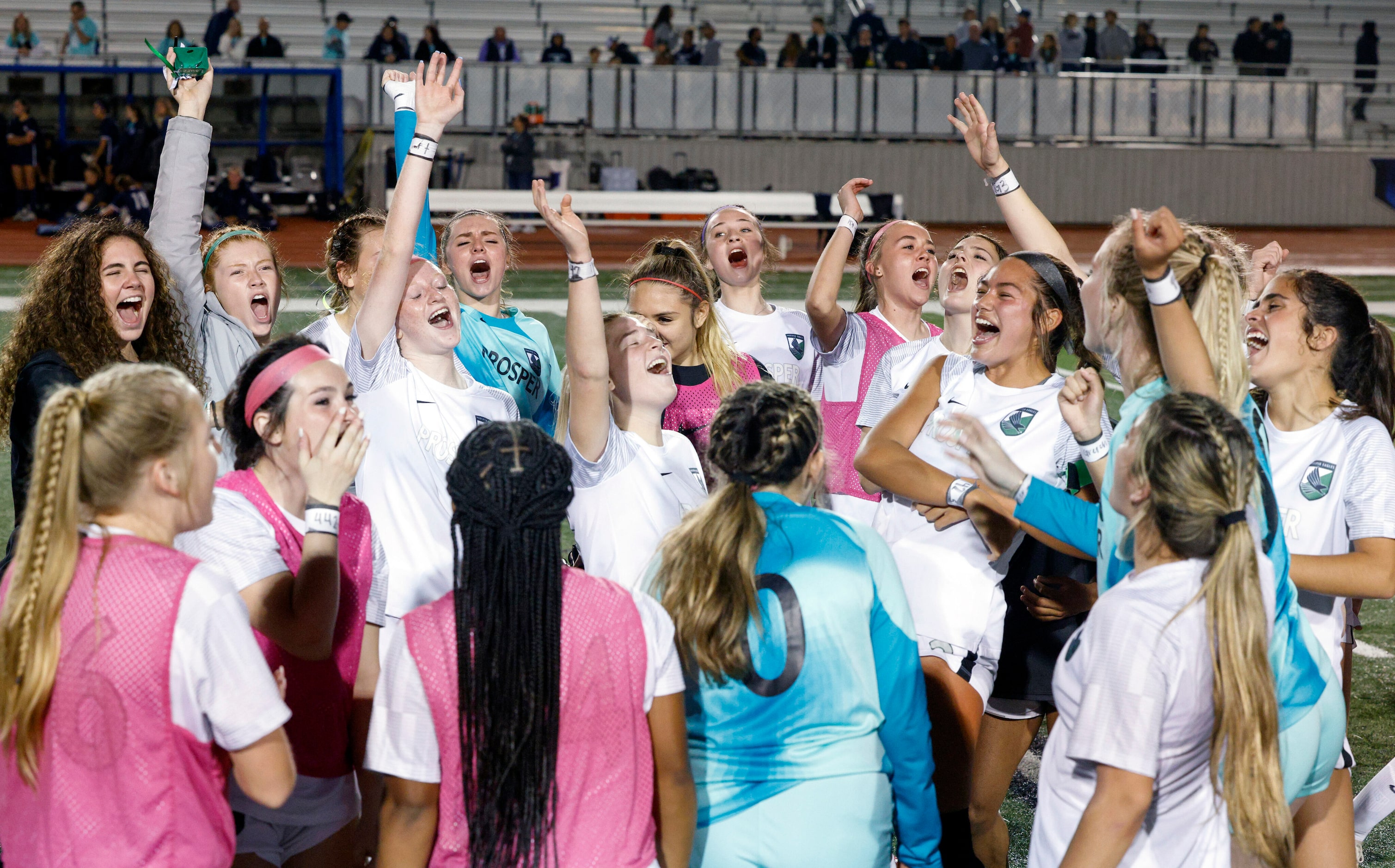 Prosper players celebrate after winning a UIL 6A bi-district playoff game against Flower...