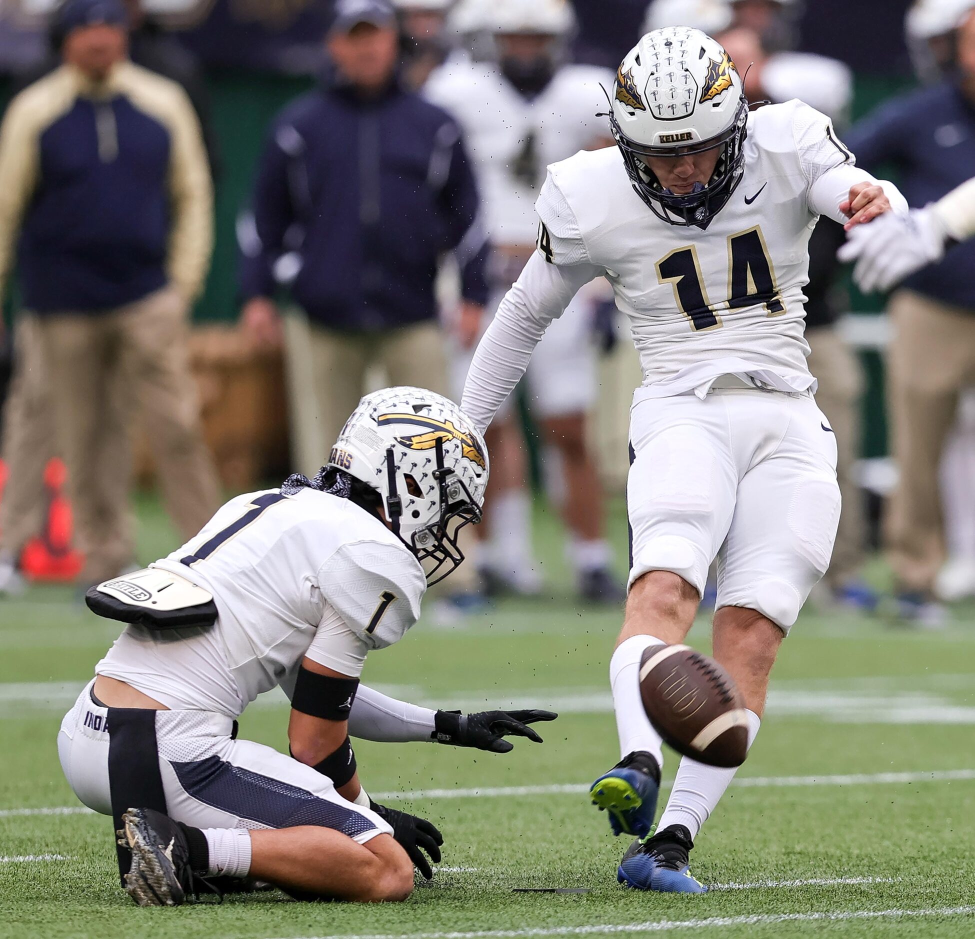 Keller kicker Garrett Martin (14) attempts a field goal against Lewisville during the first...