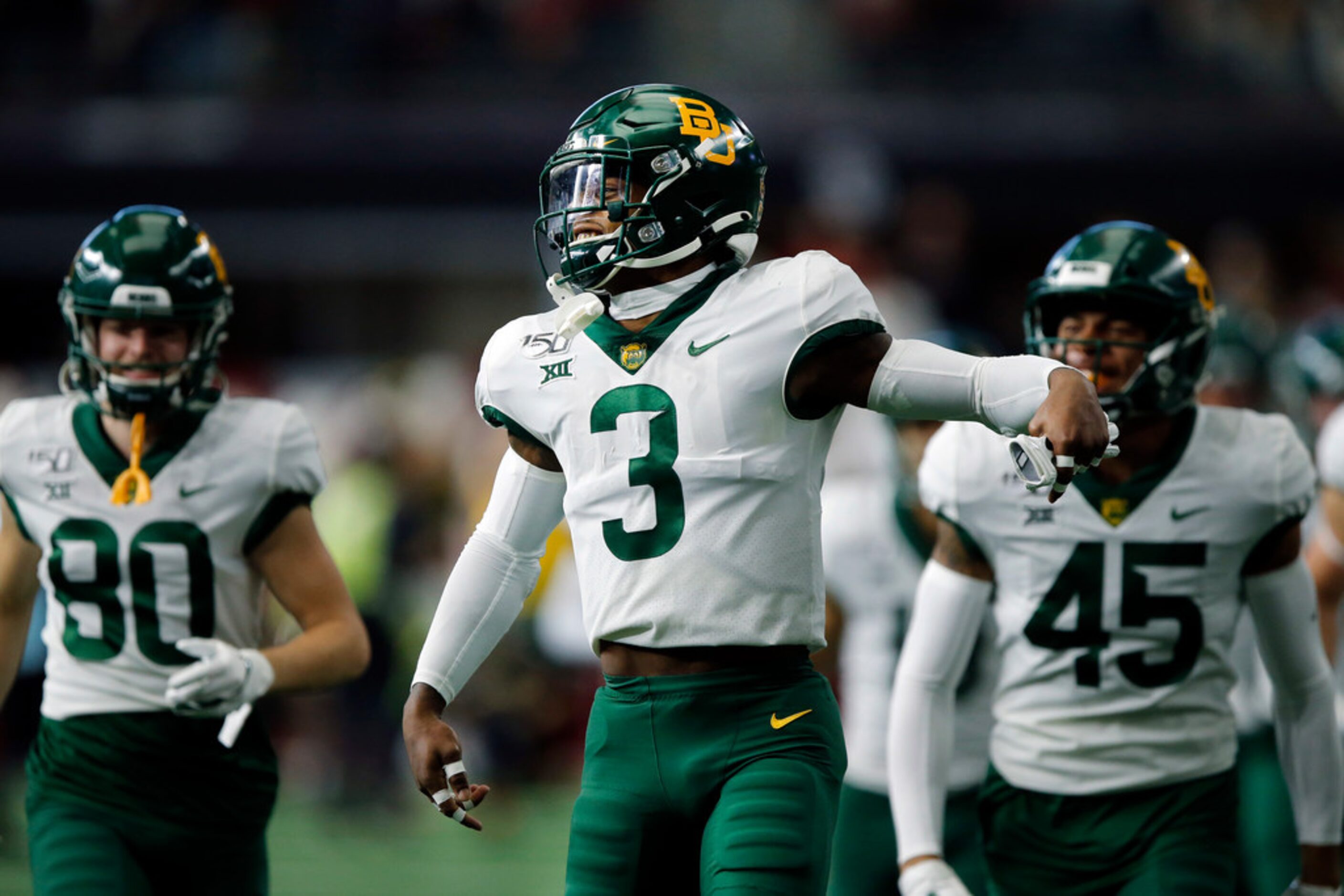 Baylor Bears safety Chris Miller (3) leads him team onto the field during team introductions...