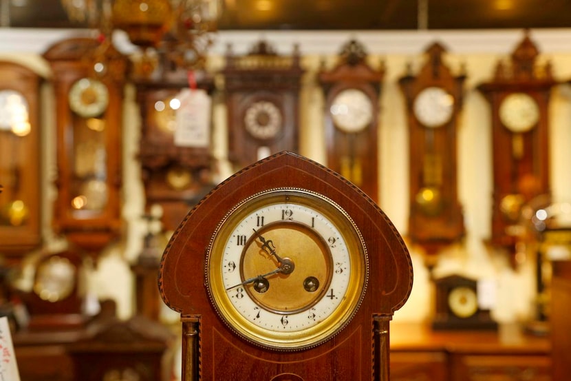 
Juver’s wall clocks (background), mantel clocks (foreground) and grandfather clocks range...