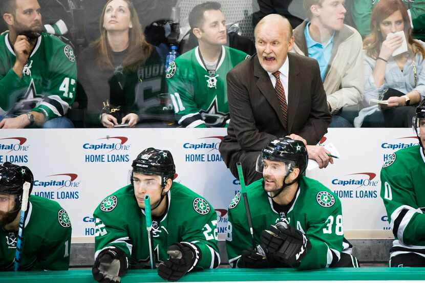 Dallas Stars head coach Lindy Ruff yells from the bench during the second period of an NHL...