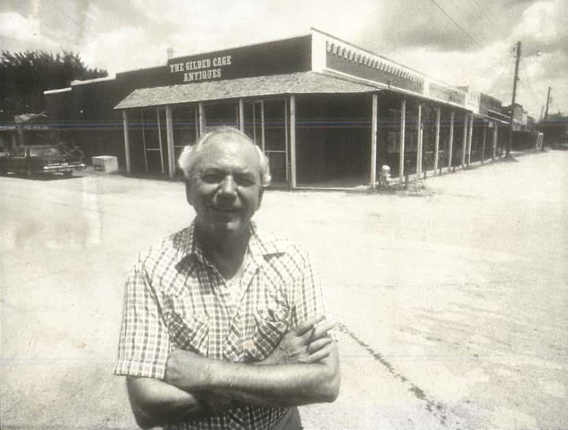 Jim Wendover standing in front of his store, The Gilded Cage, in downtown Tioga (1982).
