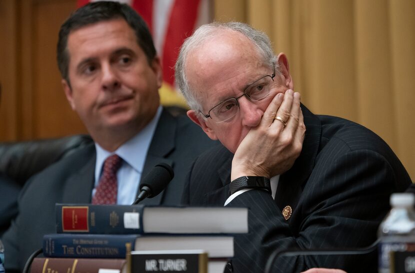 Rep. Devin Nunes, R-Calif., left, the ranking member of the House Intelligence Committee,...