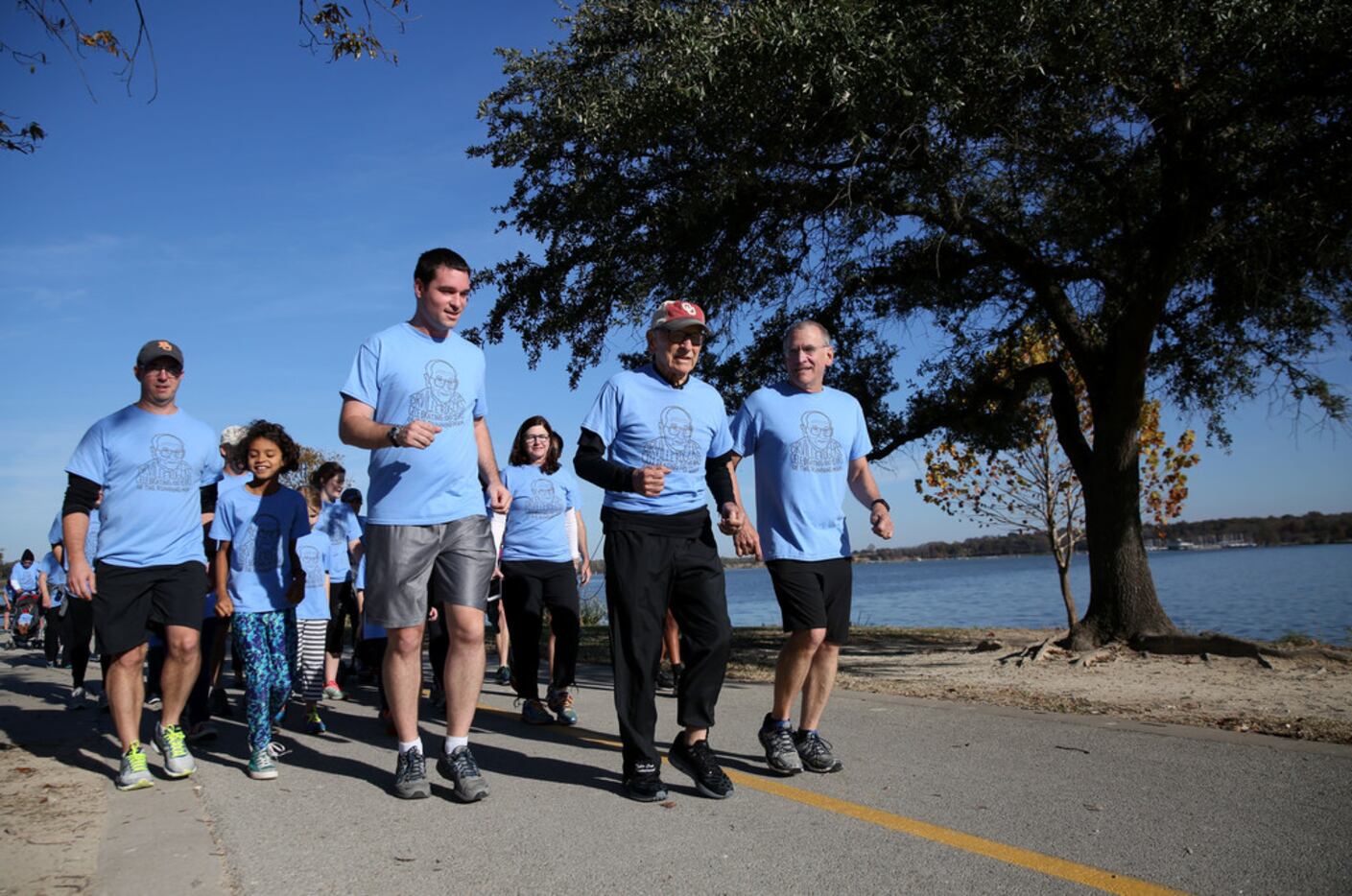 Orville Rogers, who is turning 100 years old, ran with his family near White Rock Lake in...