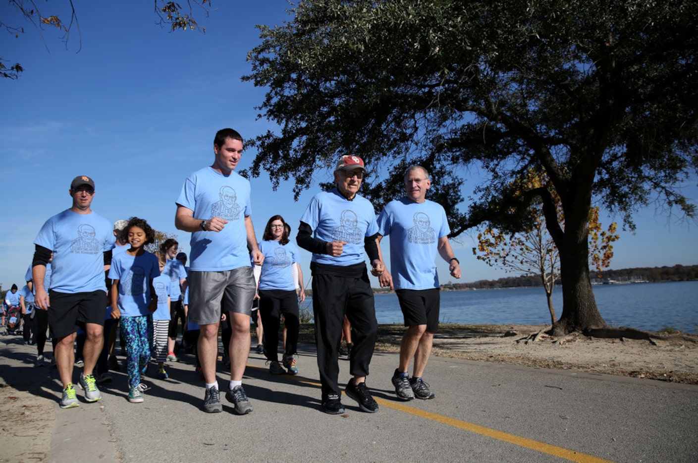 Orville Rogers, who is turning 100 years old, ran with his family near White Rock Lake in...