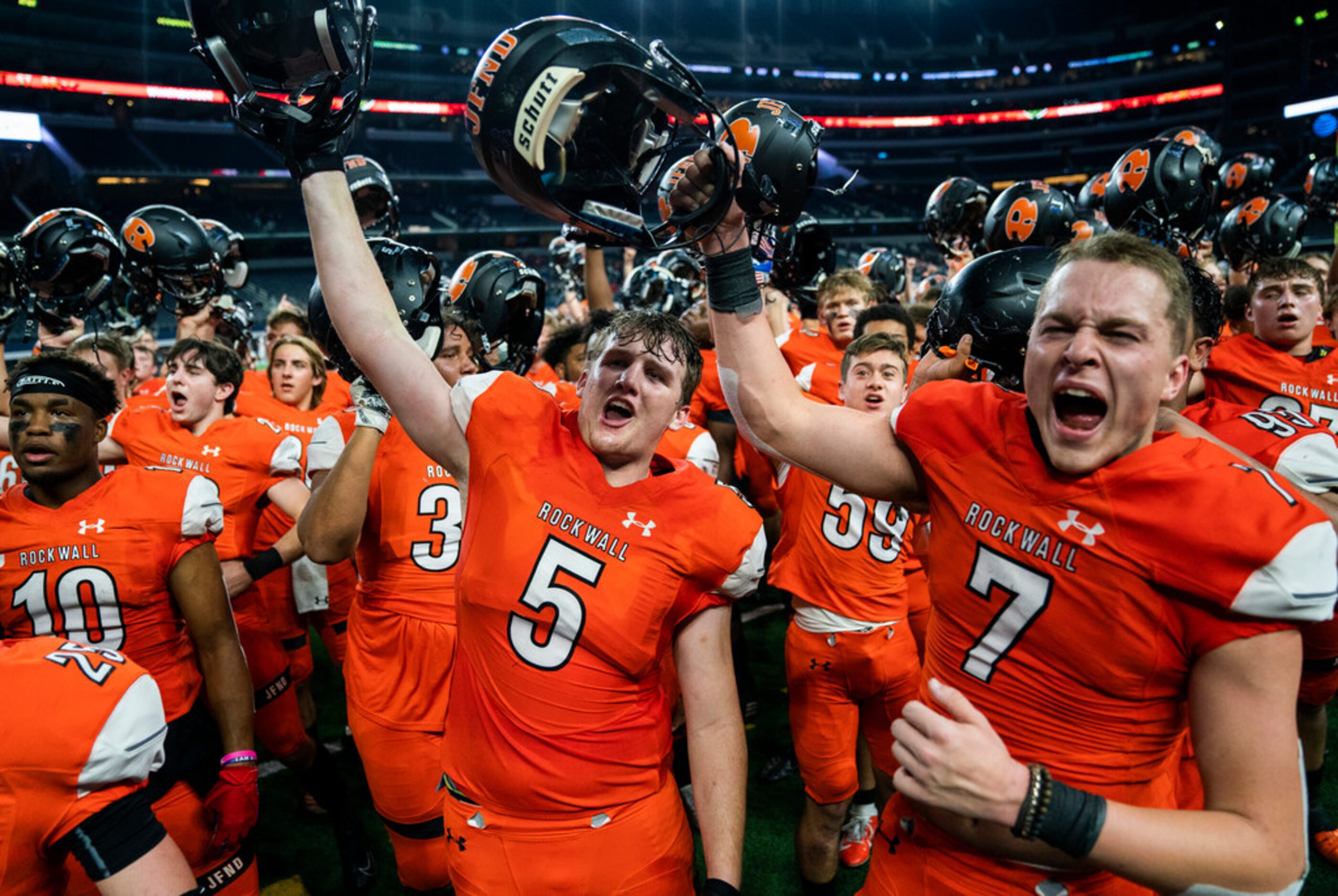 Rockwall celebrates a 60-59 win over Allen in a Class 6A Division I area-round high school...