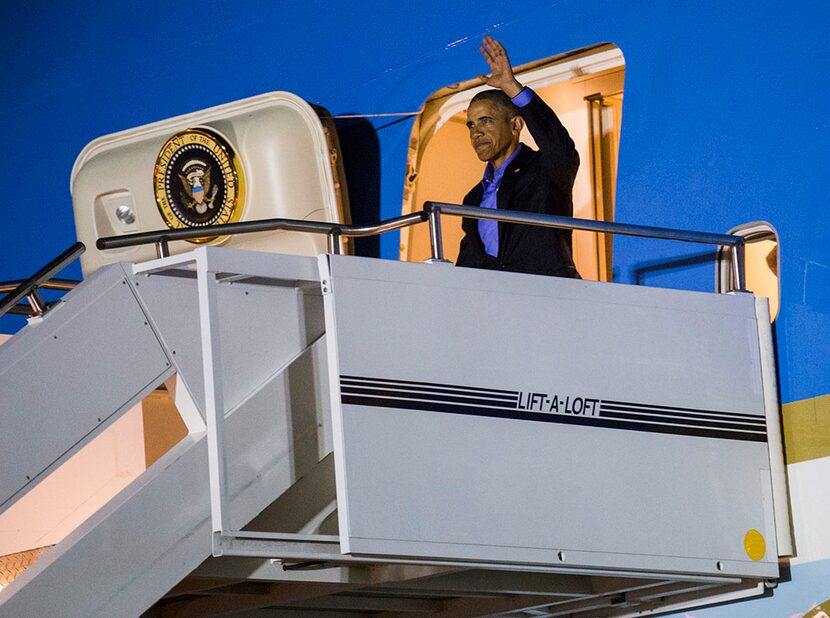  President Obama disembarks from Air Force One. (Ashley Landis/Staff Photographer)