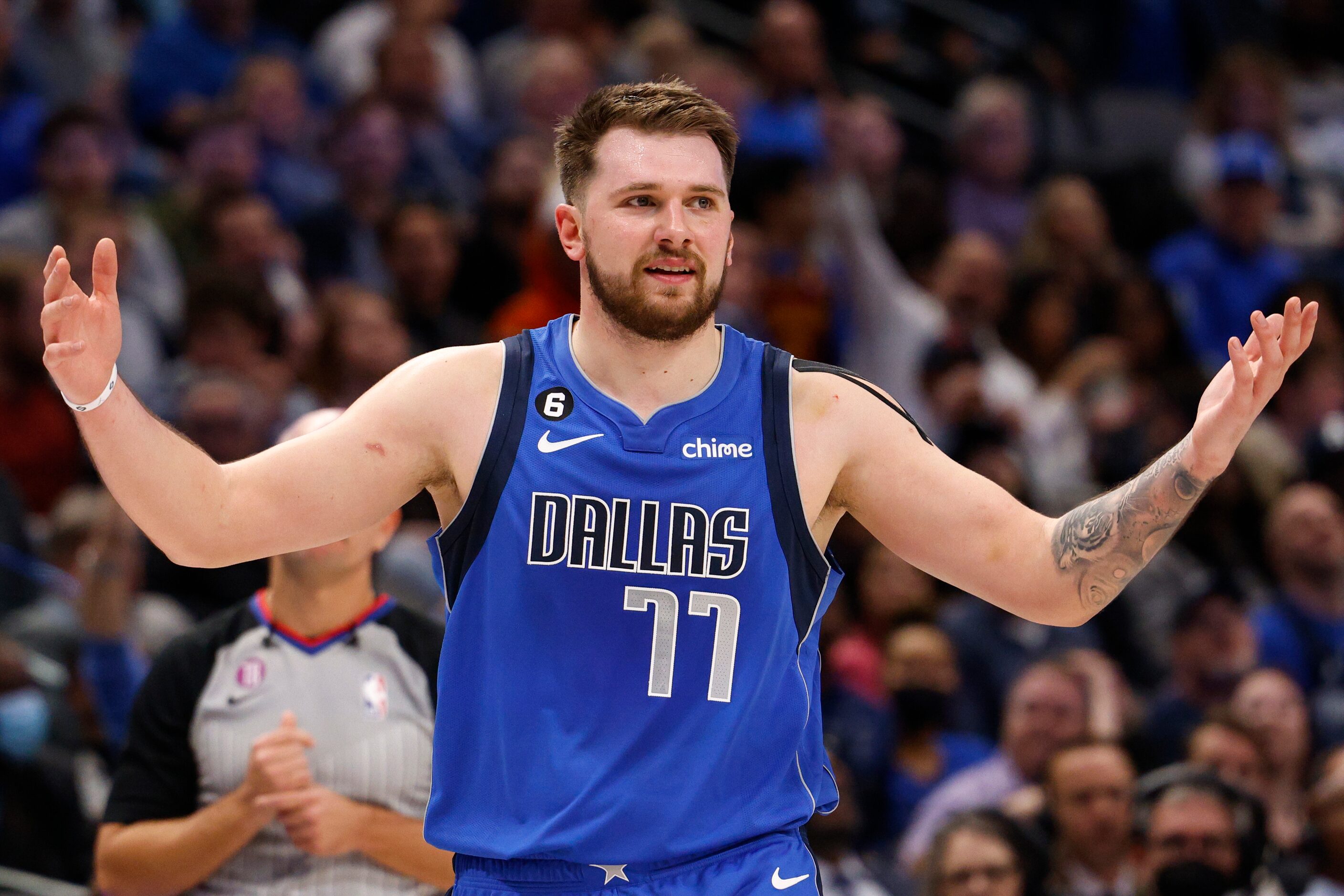 Dallas Mavericks guard Luka Doncic (77) reacts after being called for a foul during the...