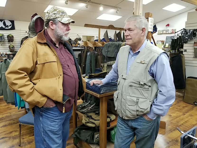 Former Dallas congressman Pete Sessions speaks with supporter Jerry Gribble in College...