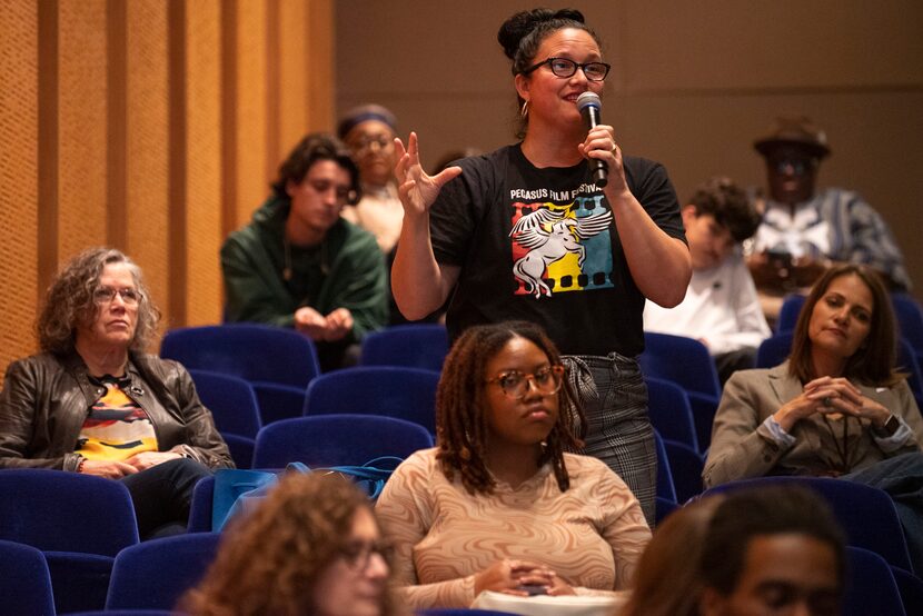 Tamitha Barbosa Curiel, with Pegasus Media Project, asks a question during a panel...