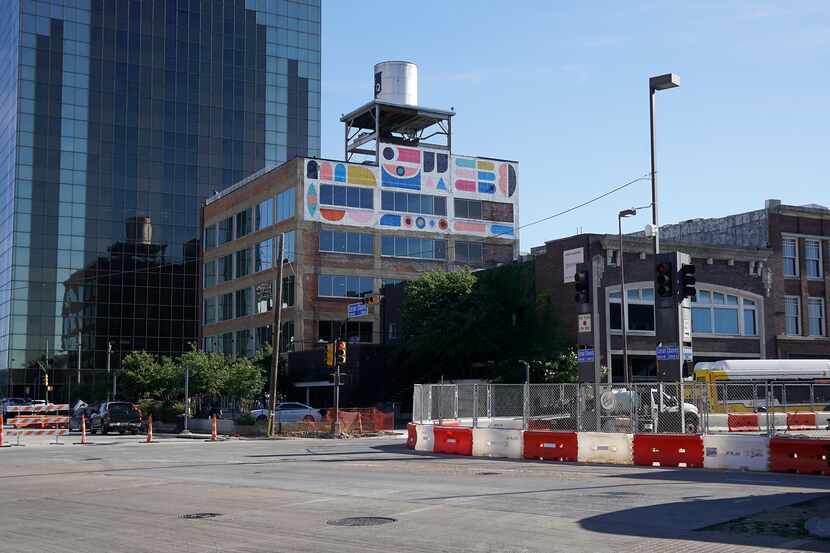 Artist Kyle Steed's art graces the back of a building being renovated at 2200 Main St. in...