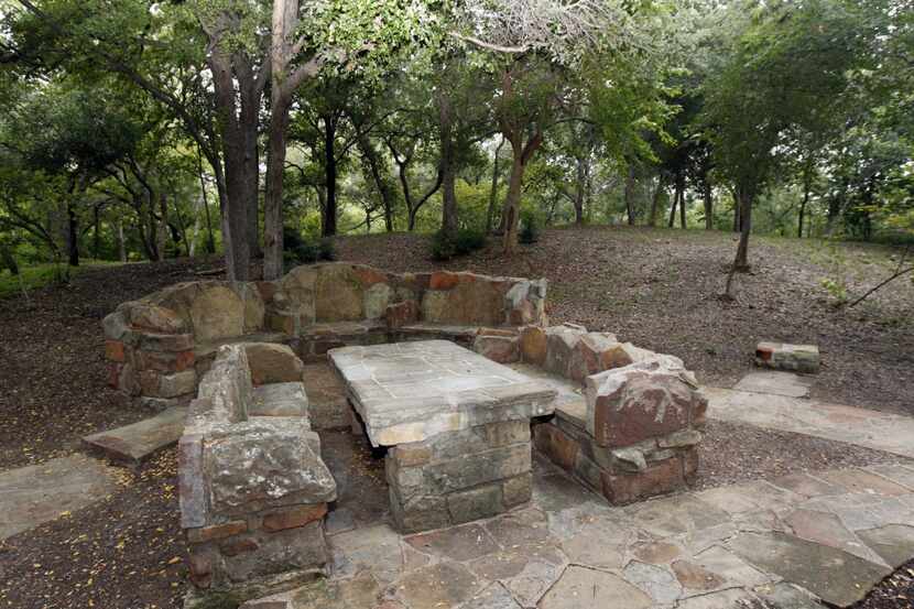 Stone picnic tables and benches were among the elements included in a $2.1 million project...