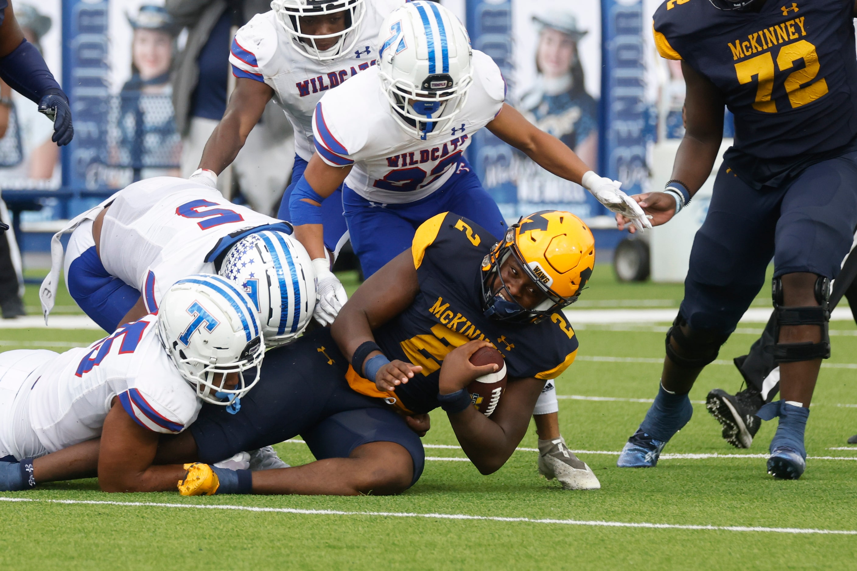 McKinney High’s Bryan Jackson (2) gets tackled during a season-opening football game against...