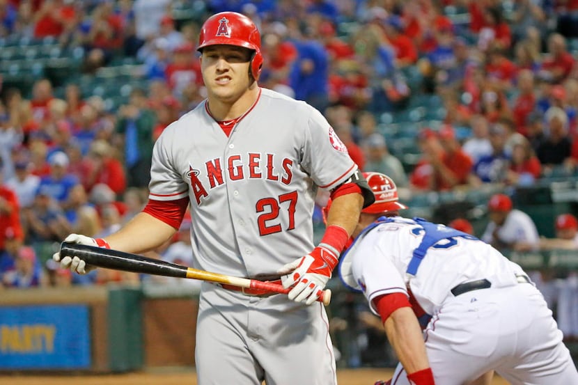 Los Angeles Angels center fielder Mike Trout (27) strikes out in the first inning during the...