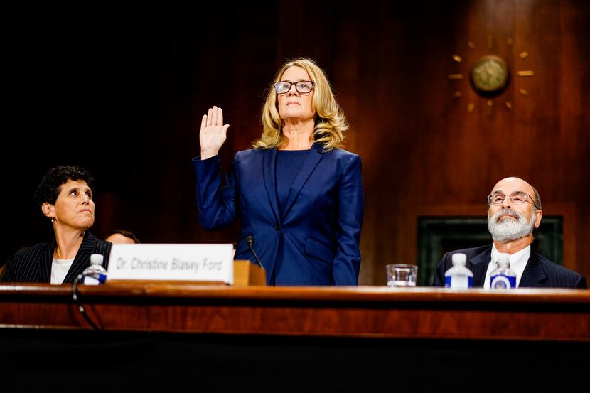 Christine Blasey Ford is sworn in to testify before the Senate Judiciary Committee on...