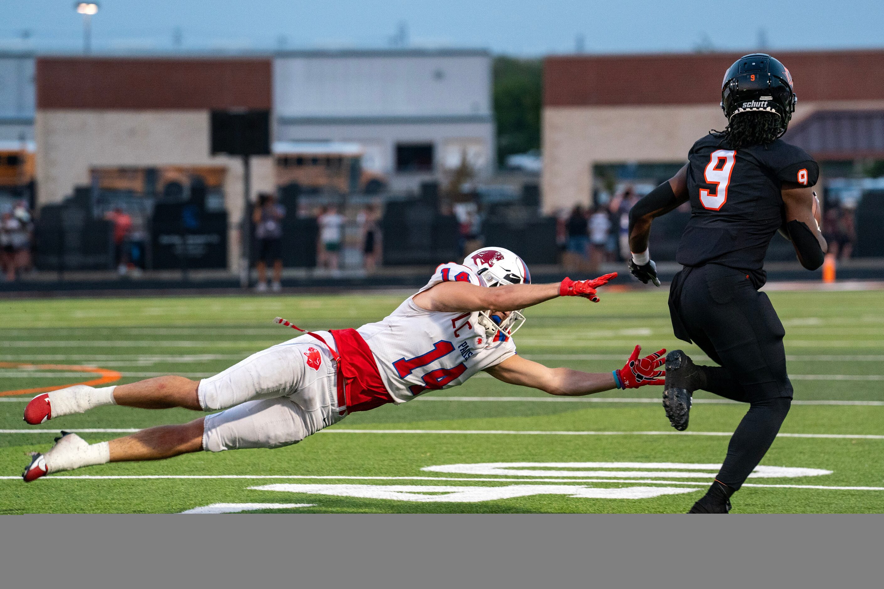 Parish Episcopal senior defensive back Mercer McDougal (14) dives but cannot reach Aledo...