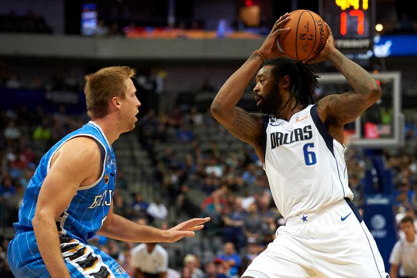 Dallas Mavericks center DeAndre Jordan (6) looks to move the ball against Beijing Ducks...