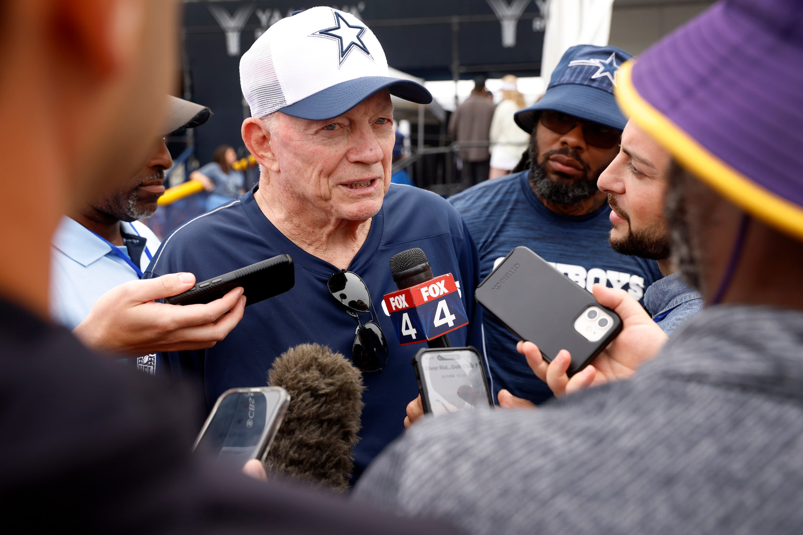 Dallas Cowboys owner Jerry Jones visits with the media following a training camp scrimmage...