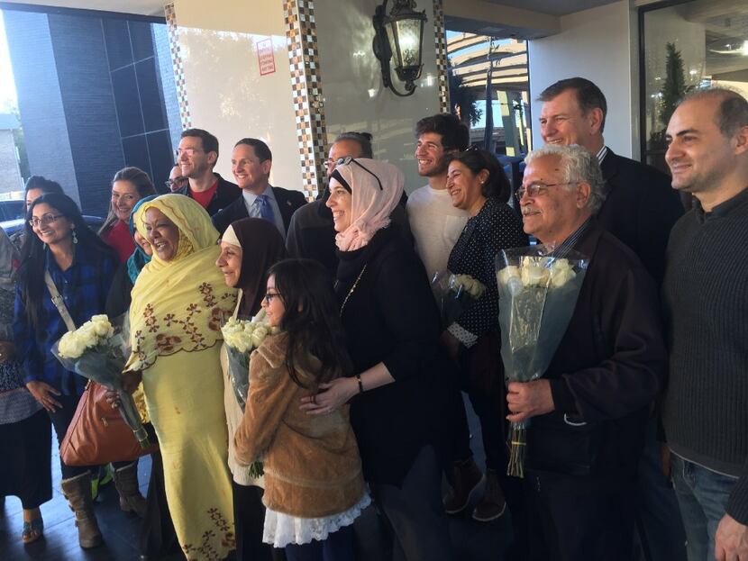 Syrians, Sudanese and Iranians posed with family members, Dallas Mayor Mike Rawlings, Dallas...
