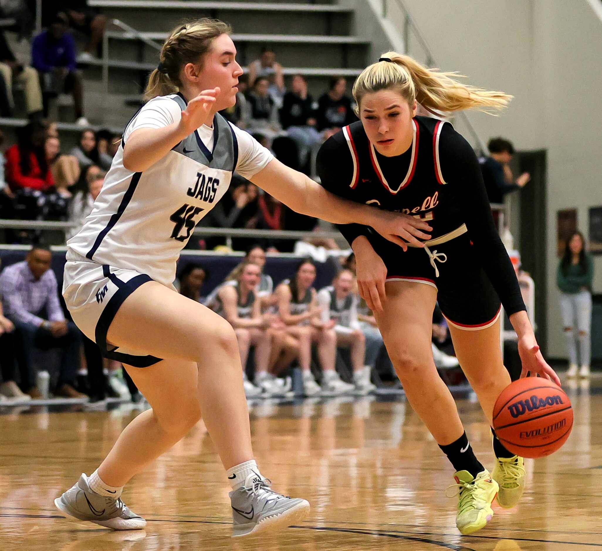 Coppell guard Julianna Lamendola, (right) tries to go around Flower Mound forward Natalie...