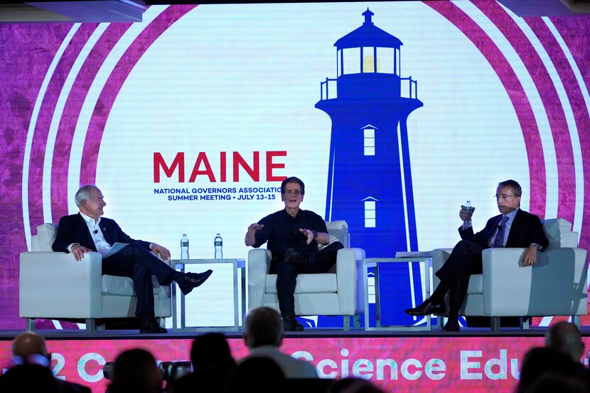 Dean Kamen, founder of First, center, speaks during a panel discussion with Arkansas Gov....