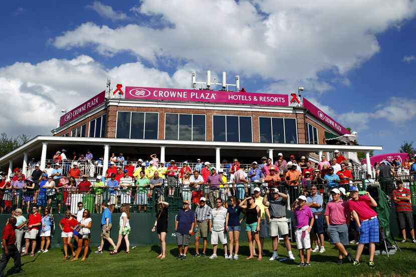 Fans watch the trophy presentation after PGA Tour golfer Boo Weekley won the Crowne Plaza...