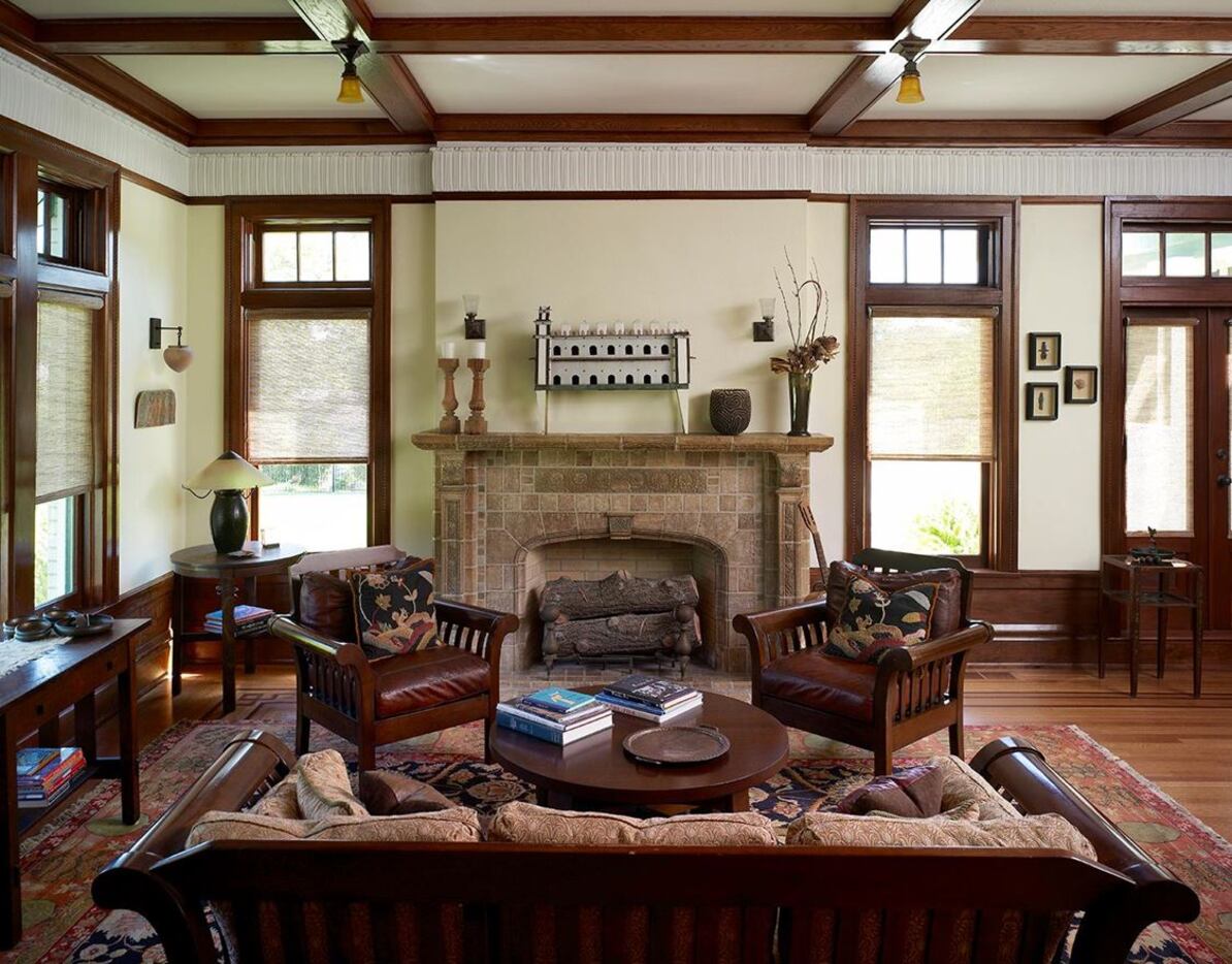 The living room of the Parks Estate is lined with American black walnut. The room's...