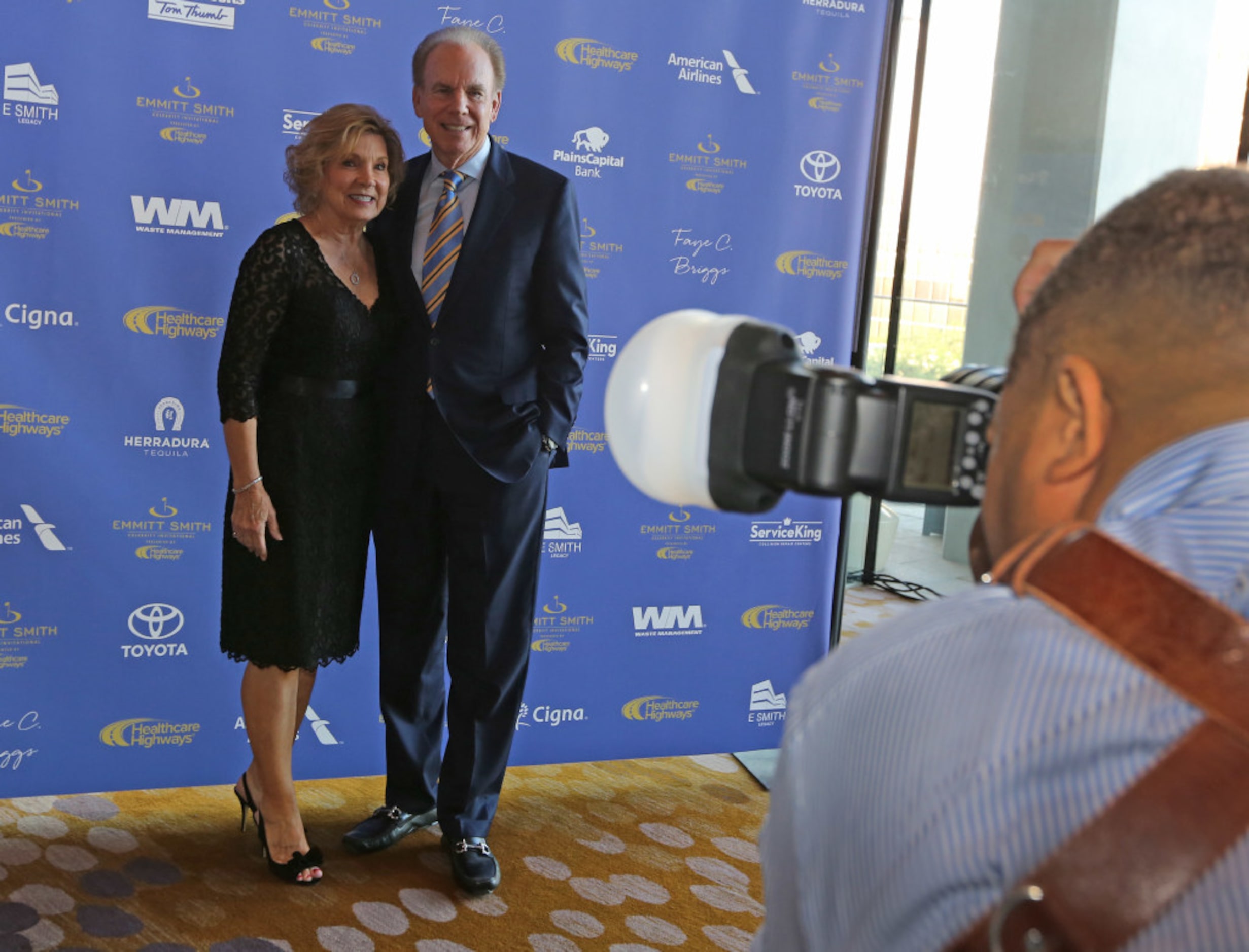 Roger Staubach and his wife Marianne pose for the photographers during the red carpet walk...